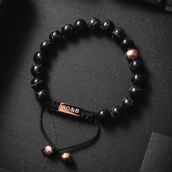 Premium Black Stone Bead Bracelet - Our Premium Black Stone Bead Bracelet Features Natural Stones, Waxed Cord and Polished Rose Gold Steel Hardware. A Beautiful Addition to any Collection.